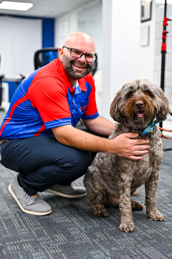 JDV Electric technician in work truck smiling and holding a thumbs up.